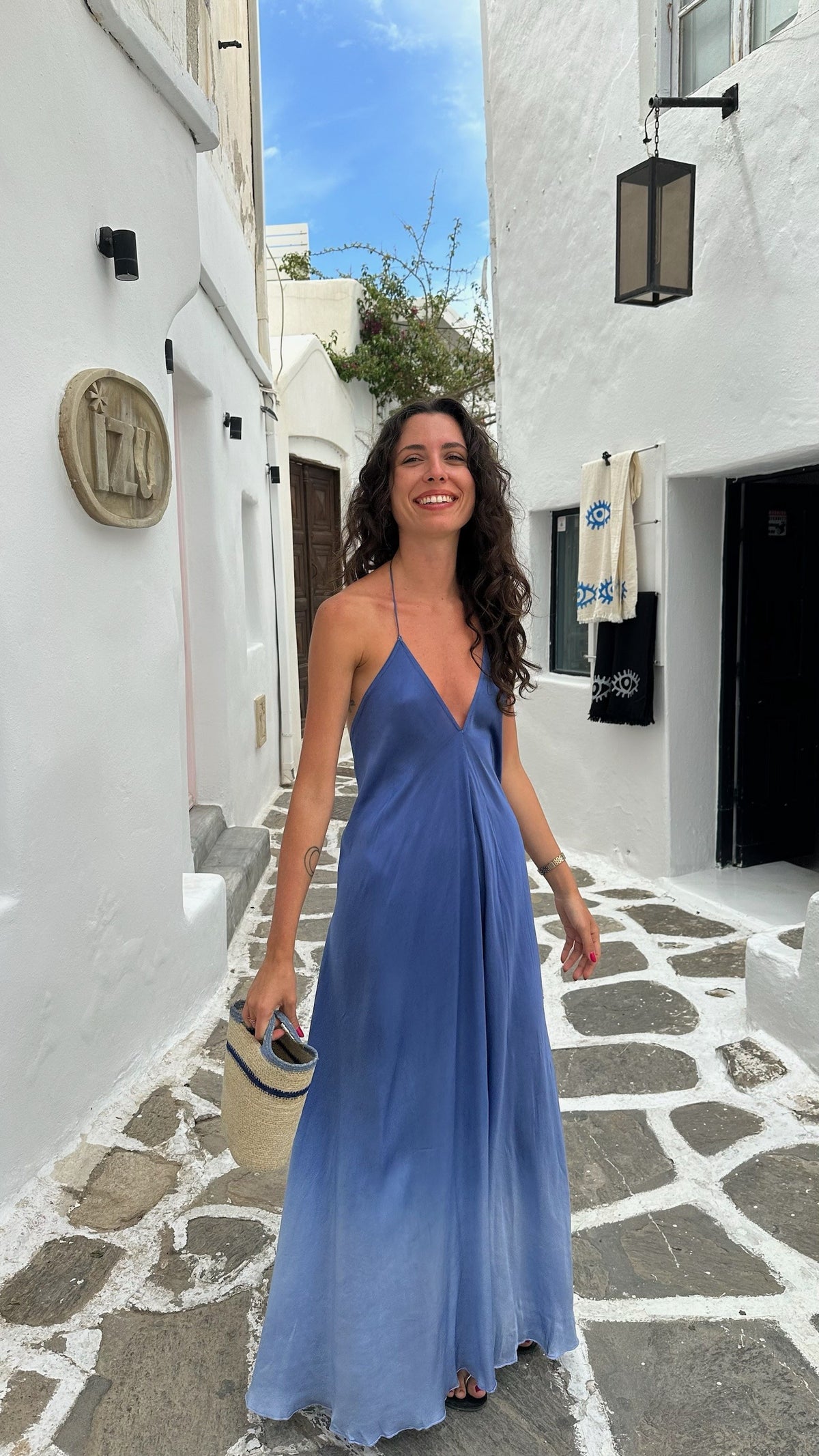 A long table under the lights, and a dress that didn't need changing for dinner.